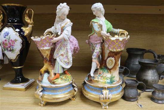 A pair of Paris porcelain figural bowls and a rolling pin